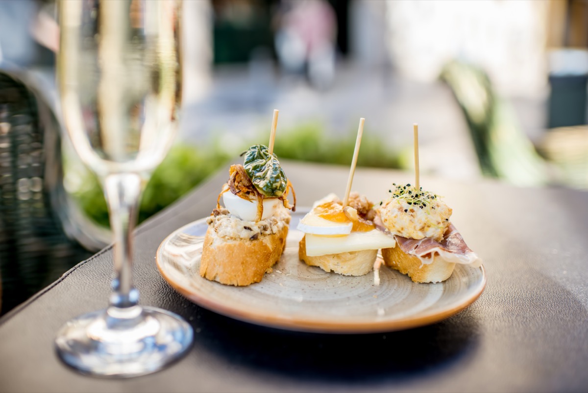 Tapas and a drink on a terrace in Valencia